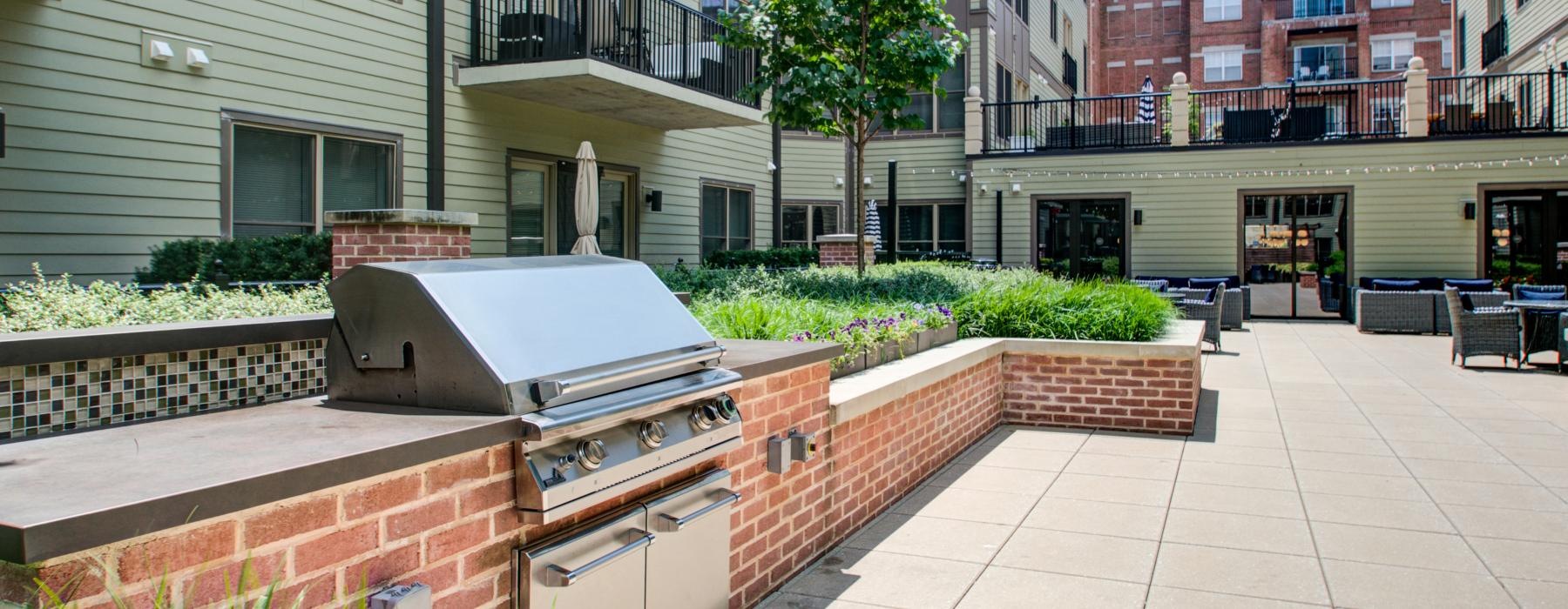 a courtyard with grills