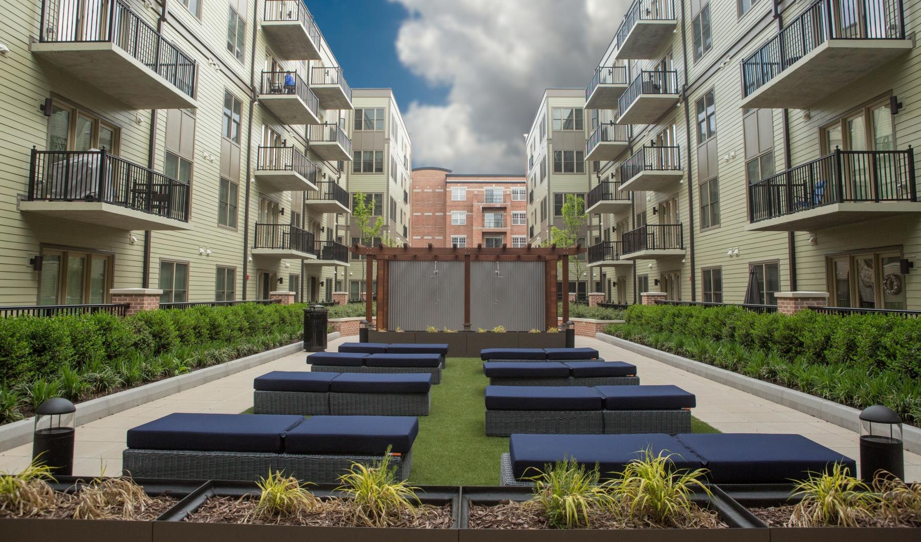 a large courtyard with seating